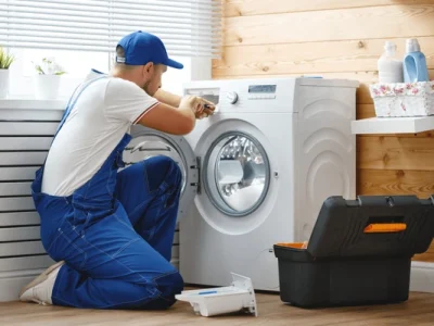working-man-plumber-repairs-washing-600nw-1051194281
